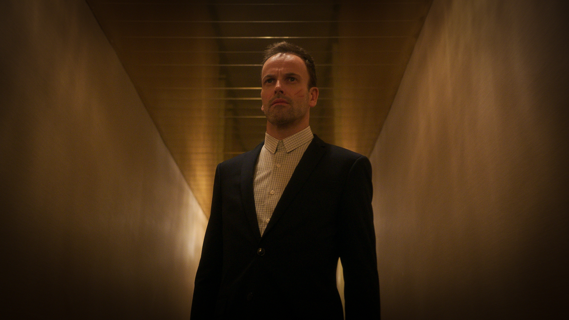 Jonny Lee Miller Tattoos Elementary
