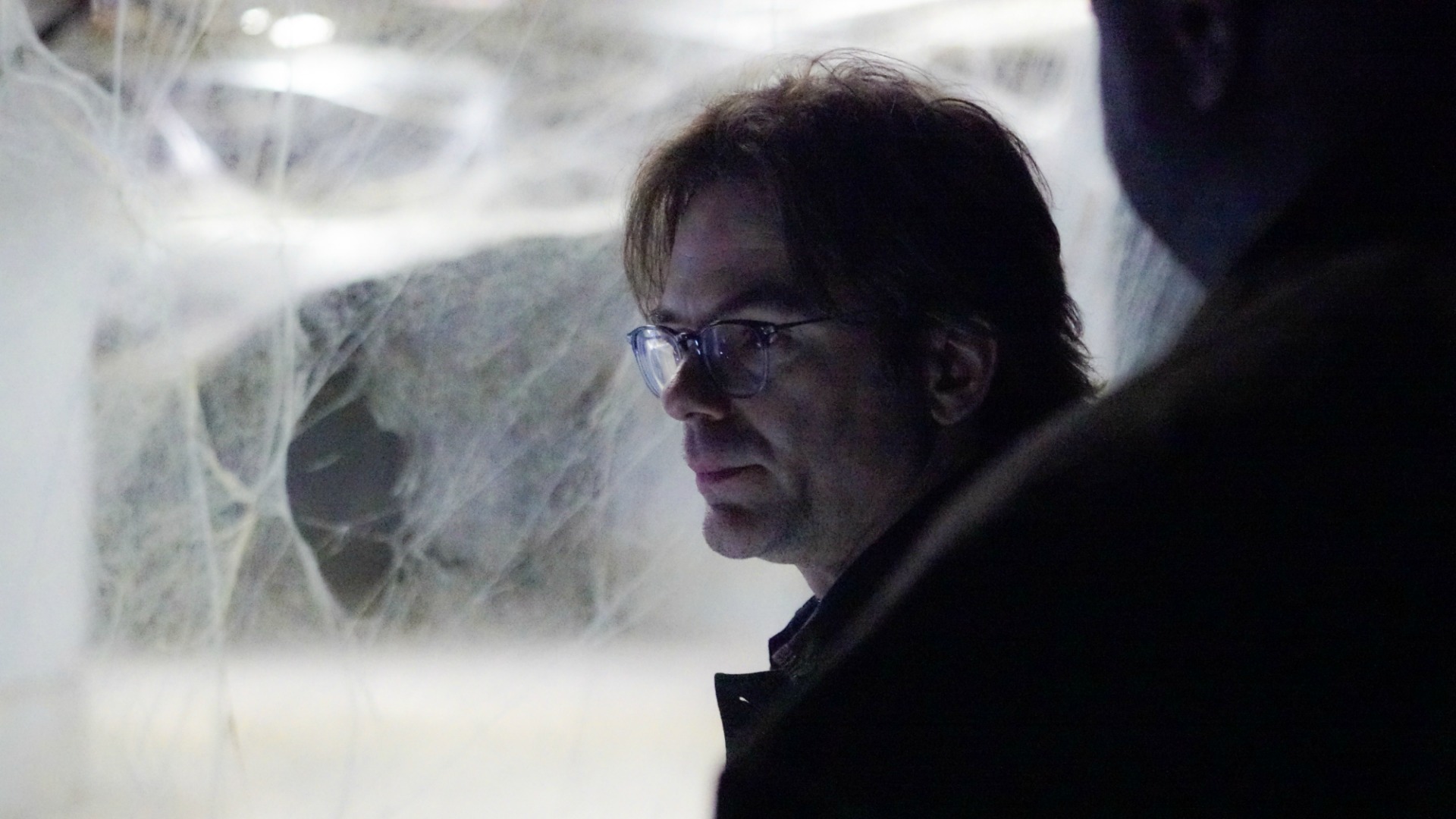 Mitch Morgan and Abraham Kenyatta navigate through dangerous spider webs.
