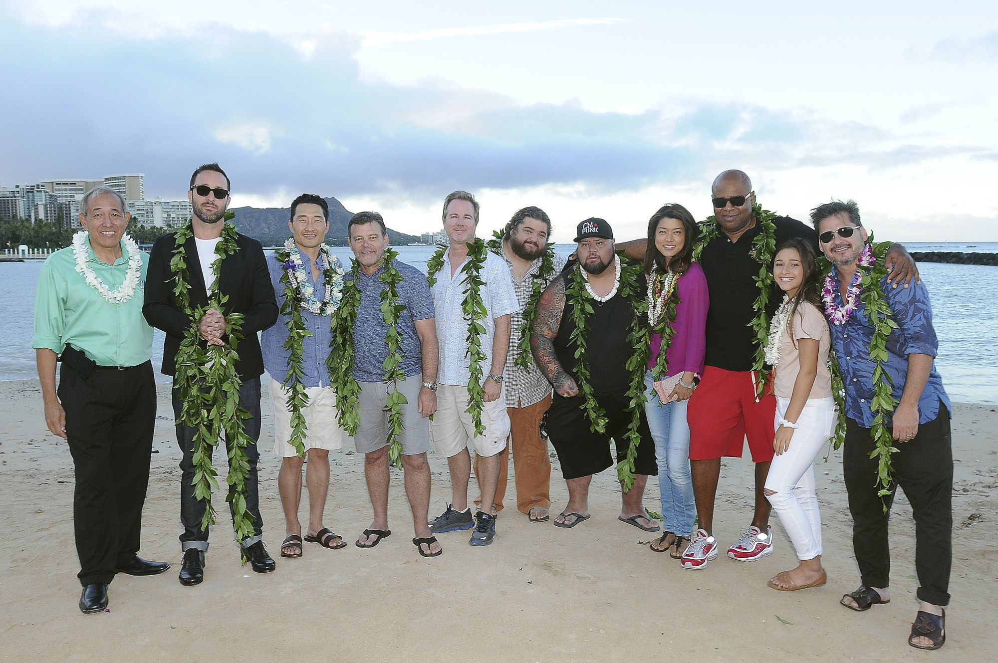 The attendees wore traditional royal maile leis for the event.