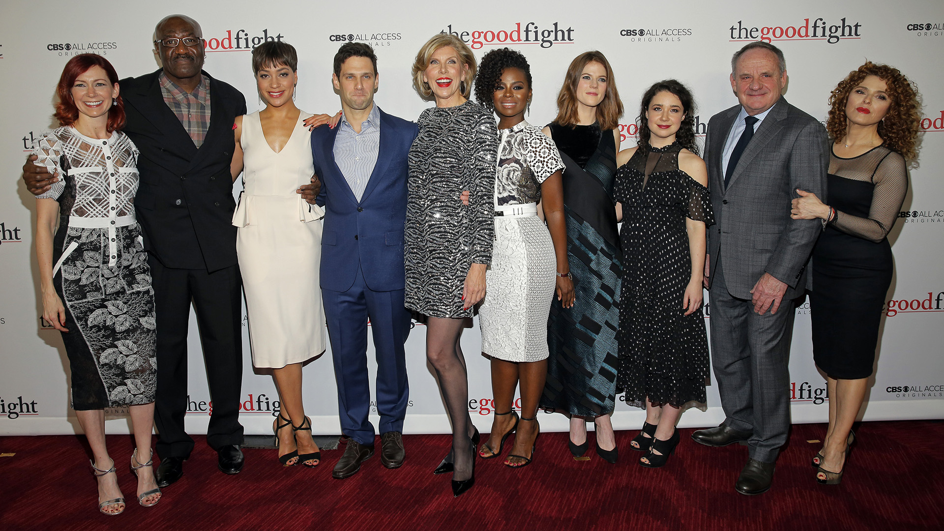 The Good Fight cast poses together for a glamorous group shot before entering the theater.