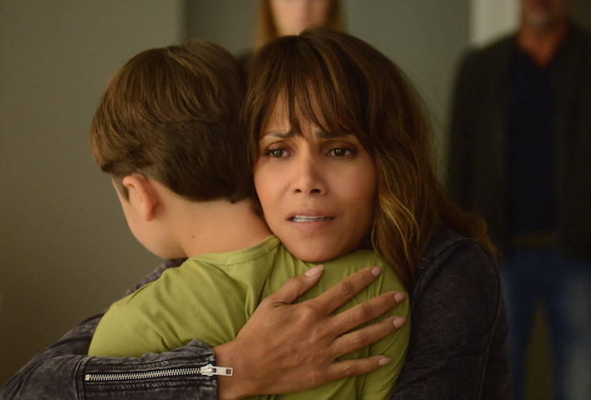 Pierce Gagnon as Ethan Woods and Halle Berry as Molly Woods.