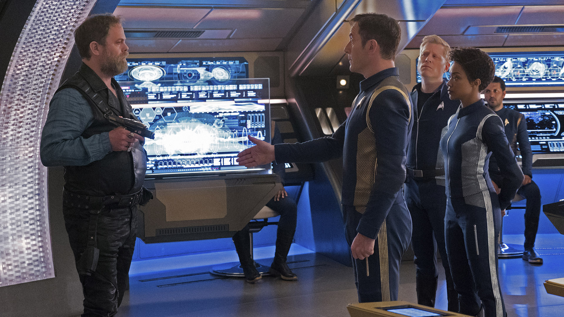 Harry Mudd (Rainn Wilson), Captain Gabriel Lorca (Jason Isaacs), Lieutenant Paul Stamets (Anthony Rapp), Michael Burnham (Sonequa Martin-Green), and Lieutenant Ash Tyler (Shazad Latif)