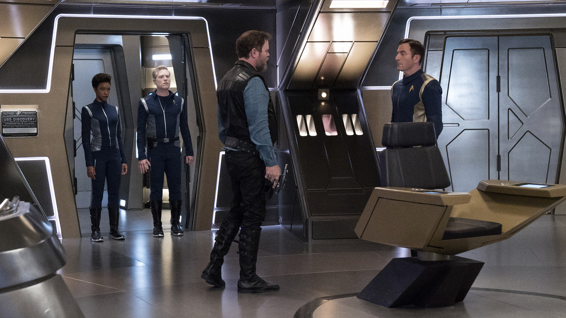 Michael Burnham (Sonequa Martin-Green), Lieutenant Paul Stamets (Anthony Rapp), Harry Mudd (Rainn Wilson), and Captain Gabriel Lorca (Jason Isaacs)