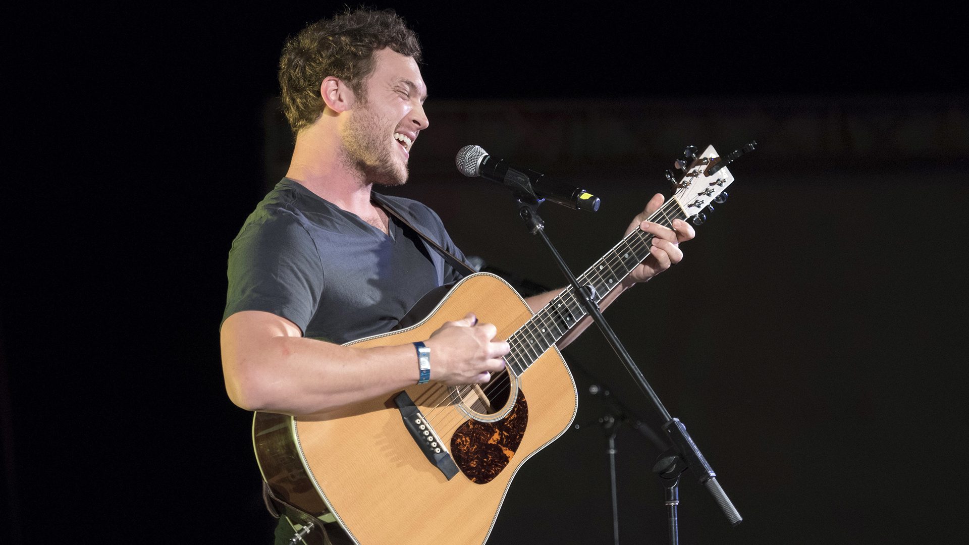 Musical artist Phillip Phillips performs for the crowd.