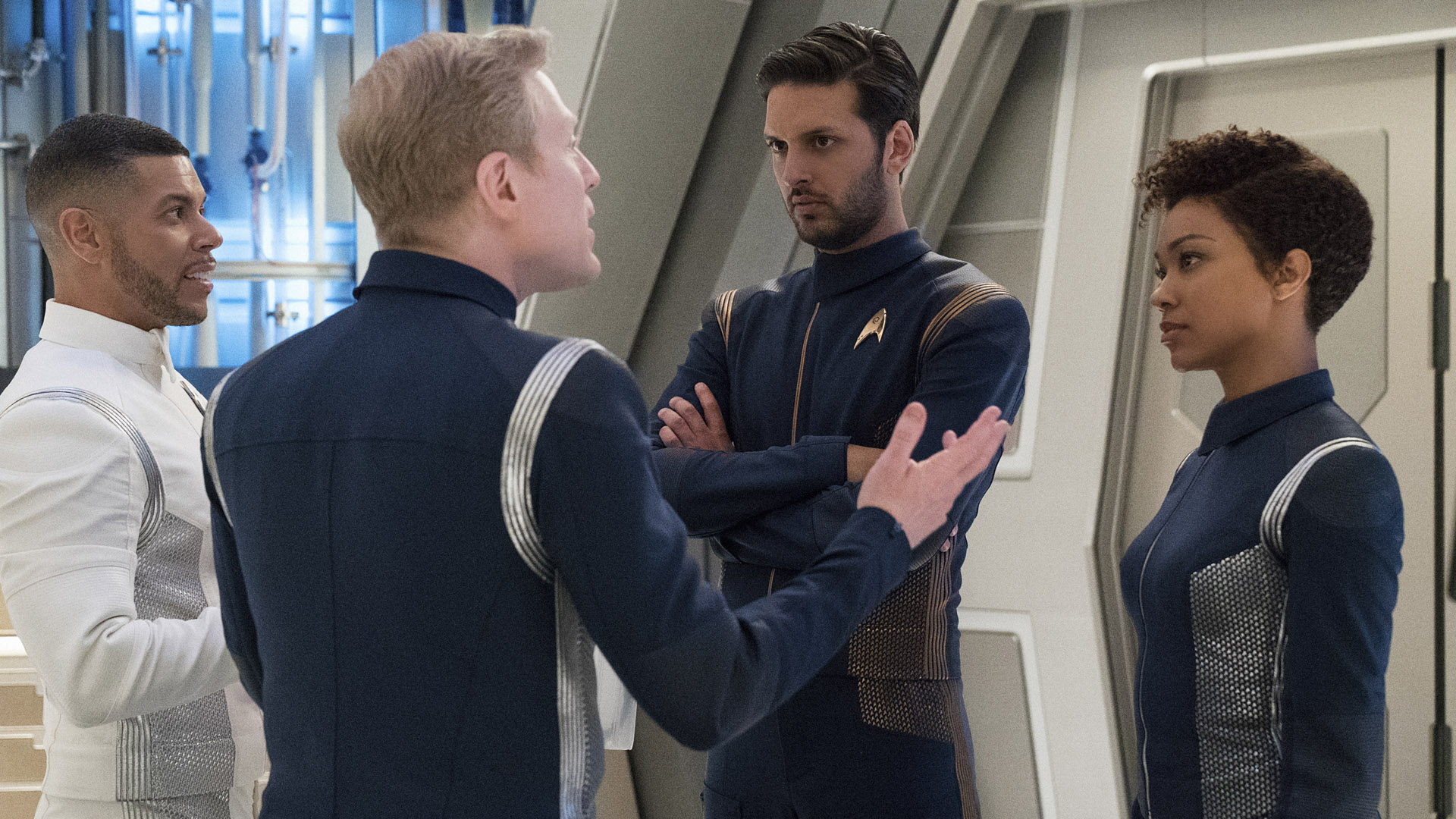 Dr. Hugh Culber (Wilson Cruz), Lieutenant Paul Stamets (Anthony Rapp), Lieutenant Ash Tyler (Shazad Latif), and Michael Burnham (Sonequa Martin-Green)