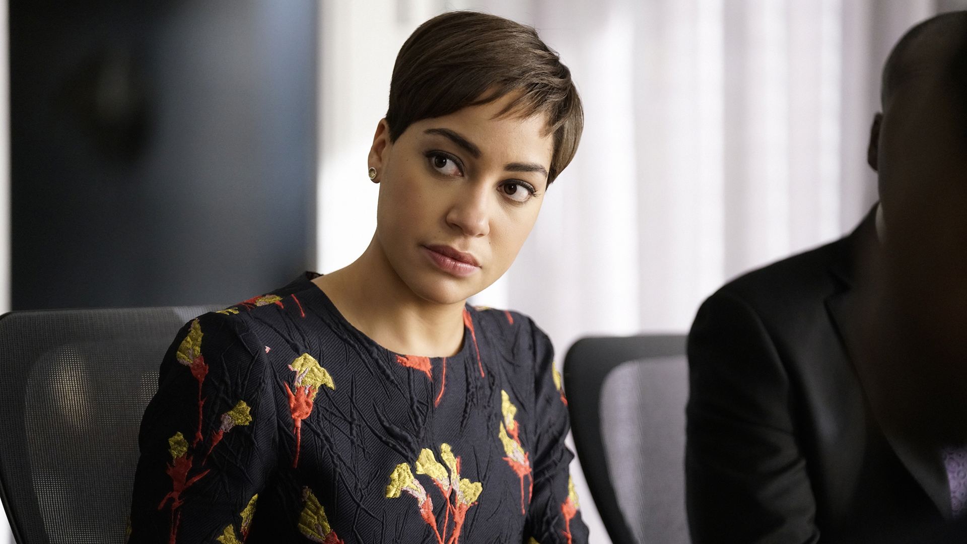 Lucca Quinn takes notes during a negotiation.