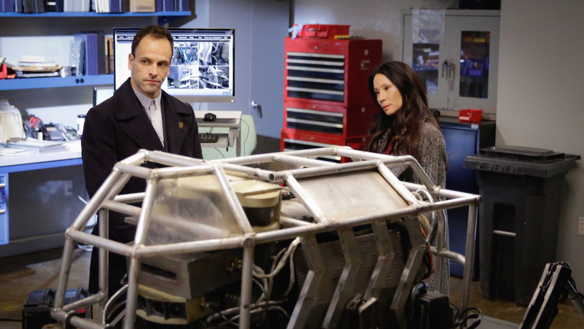 Jonny Lee Miller as Sherlock Holmes and Lucy Liu as Joan Watson