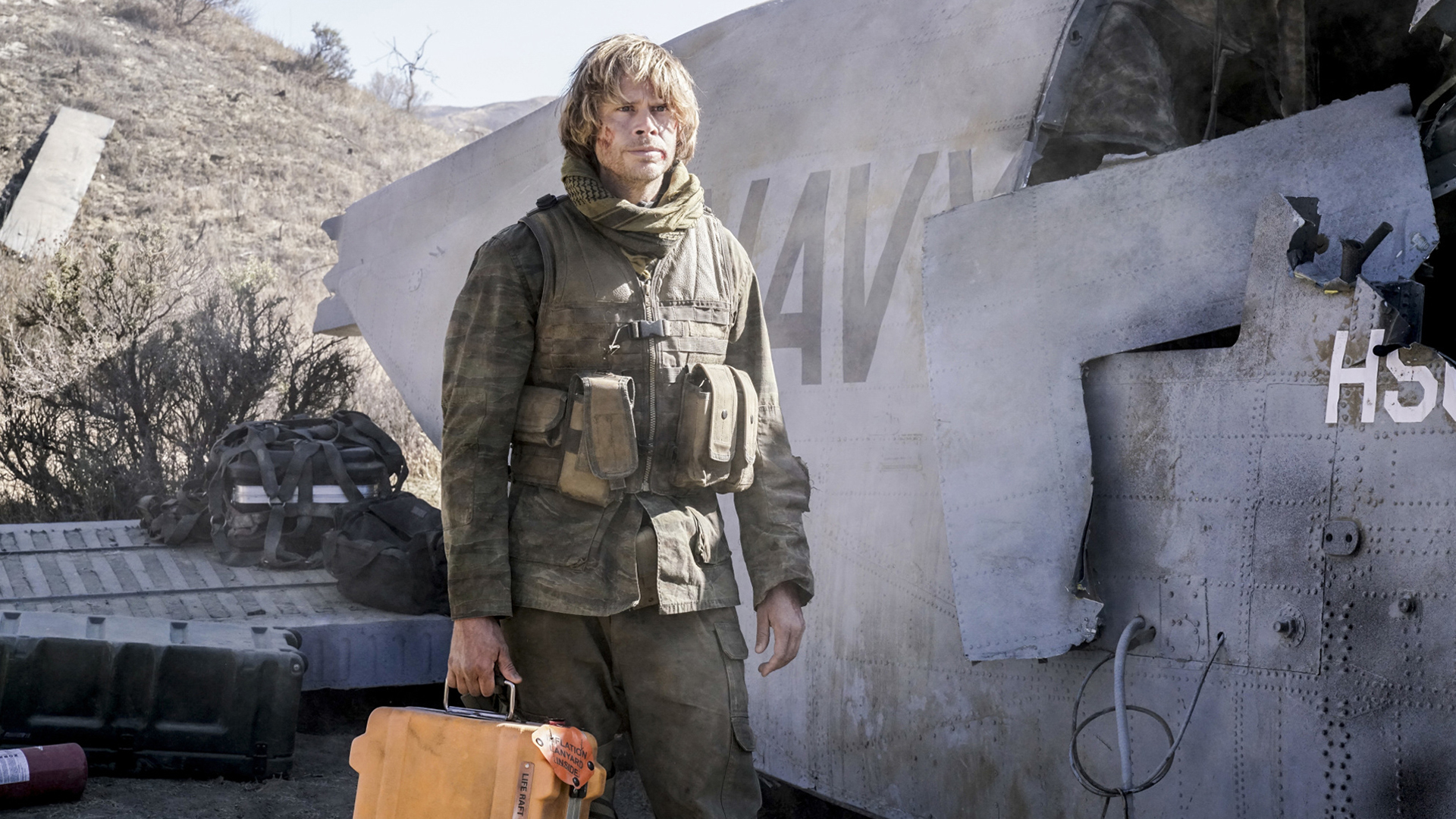Deeks grabs some gear to get out of danger.